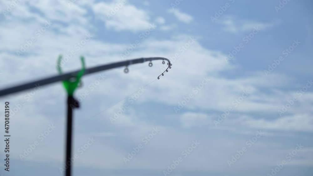 Fishing rod, enjoy hobby sport catch fish, relaxation fishery concept. Copy space. Selective focus Fishing rod, enjoy hobby sport catch fish, relaxation fishery concept. Copy space. Selective focus