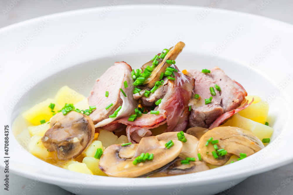 veal roll in bacon with mushroom sauce and potatoes veal roll in bacon with mushroom sauce and potatoes