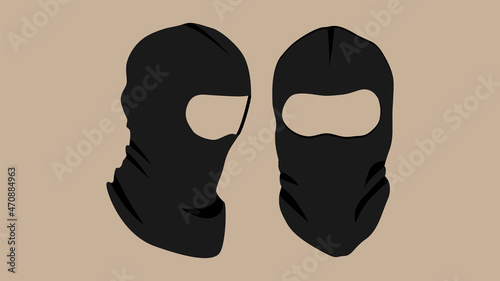 Black balaclava or bandit mask. Vector image of a black mask with slits for the eyes. photo