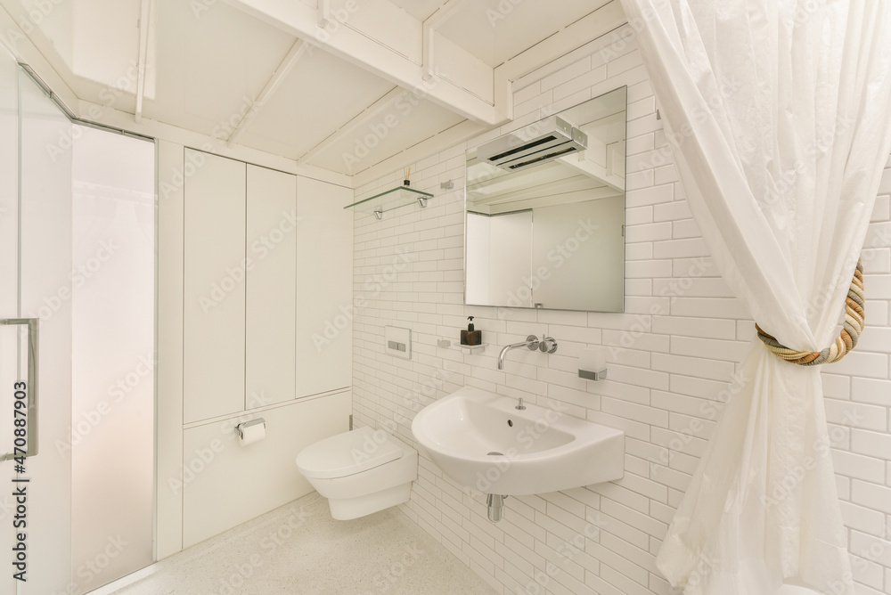 Interior of bathroom with toilet Interior of bathroom with toilet