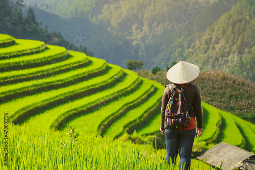 Woman enjoying rice terrace viewpoin in Mu cang chai, Vietnam © nonglak