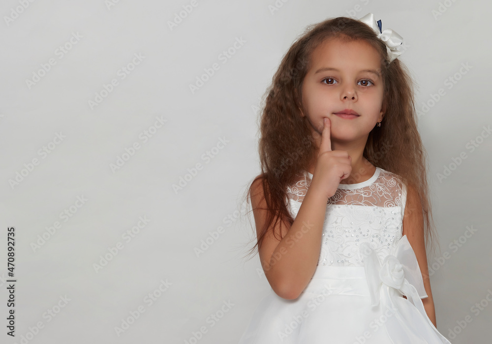 Cute girl portrait on a white background with copy space Cute girl portrait on a white background with copy space