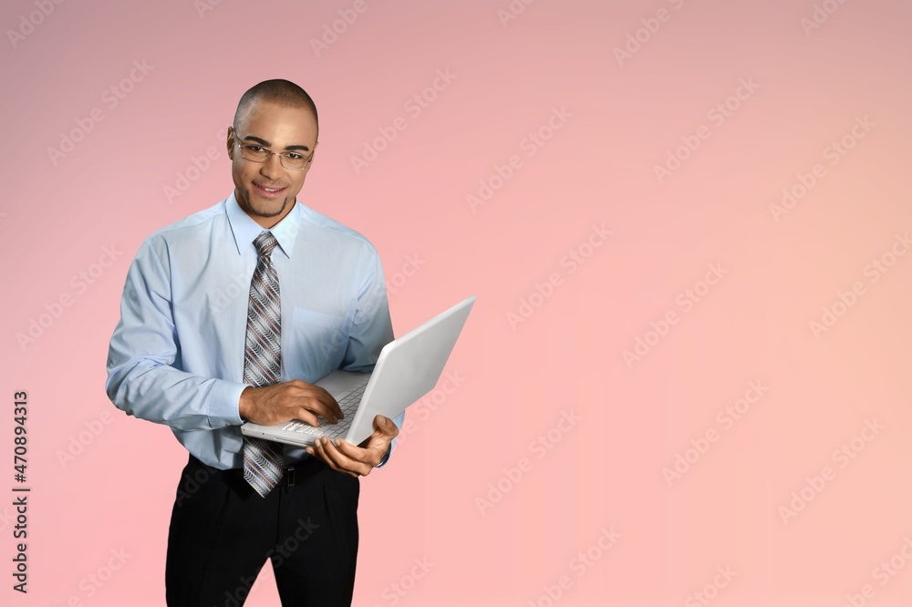 Happy young minded man work on laptop pc computer Happy young minded man work on laptop pc computer