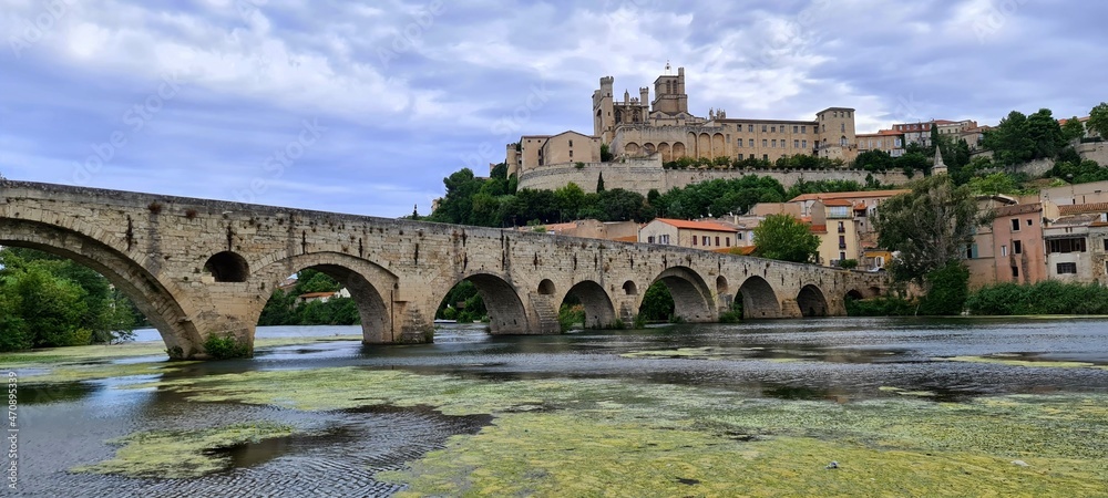 The old bridge leading towards the cathedral of Beziers, France