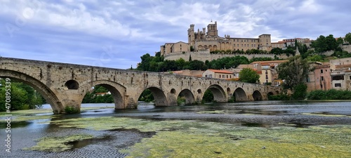 The old bridge leading towards the cathedral of Beziers, France