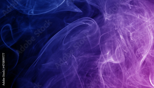 abstract colorful smoke swirls on black background