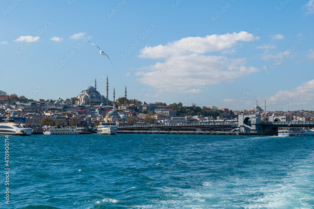 Bosphorus, the Strait of Istanbul, cruise and ferry view with Galata bridge. Istanbul cityscape with the famous landmark of Galata bridge seen from Bosphorus.