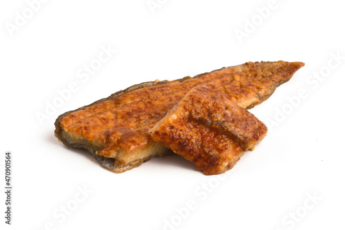 eel in unagi sauce on a white plate