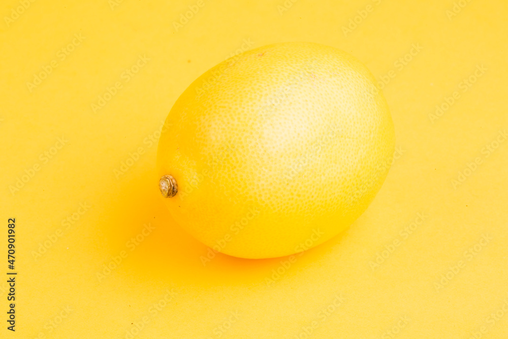 yellow lemon on yellow background yellow lemon on yellow background