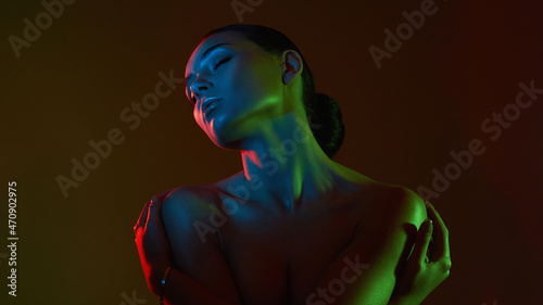 beautiful woman in color lights