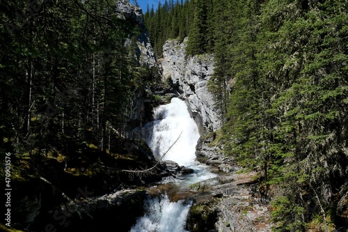 Waterfall in the forest naer Memorial Lake at Ribbon Creek Kananaskis Canada photo