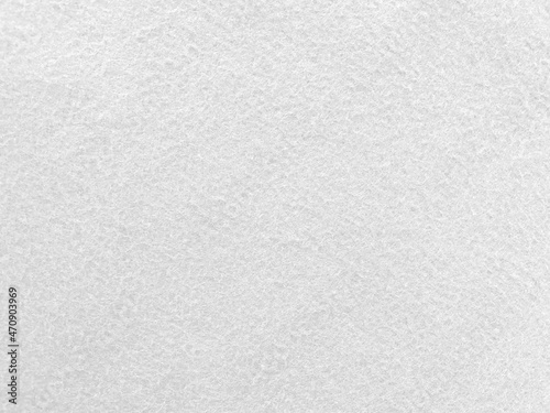 Felt white soft rough textile material background texture close up,poker table,tennis ball,table cloth. Empty white fabric background..