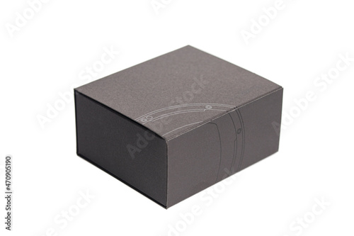 Black closed cardboard box isolated on a white background