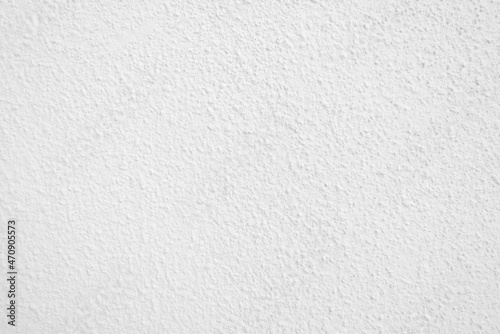 Seamless texture of white cement wall a rough surface, with space for text, for a background..