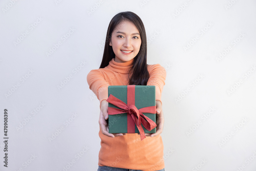 Asian Woman Holding Green Present Box on White Background Asian Woman Holding Green Present Box on White Background