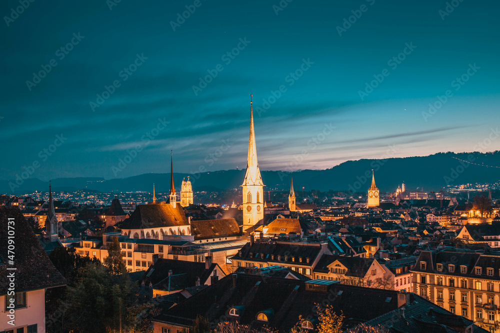 zurich skyline with church steeples at night Switzerland