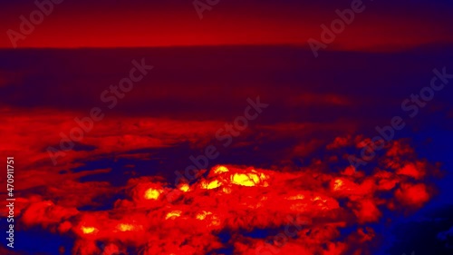 Cloudy landscape (cloudscape) - towering cumulus cloud. View from above, from the window of the aircraft. Illustration of thermal image photo