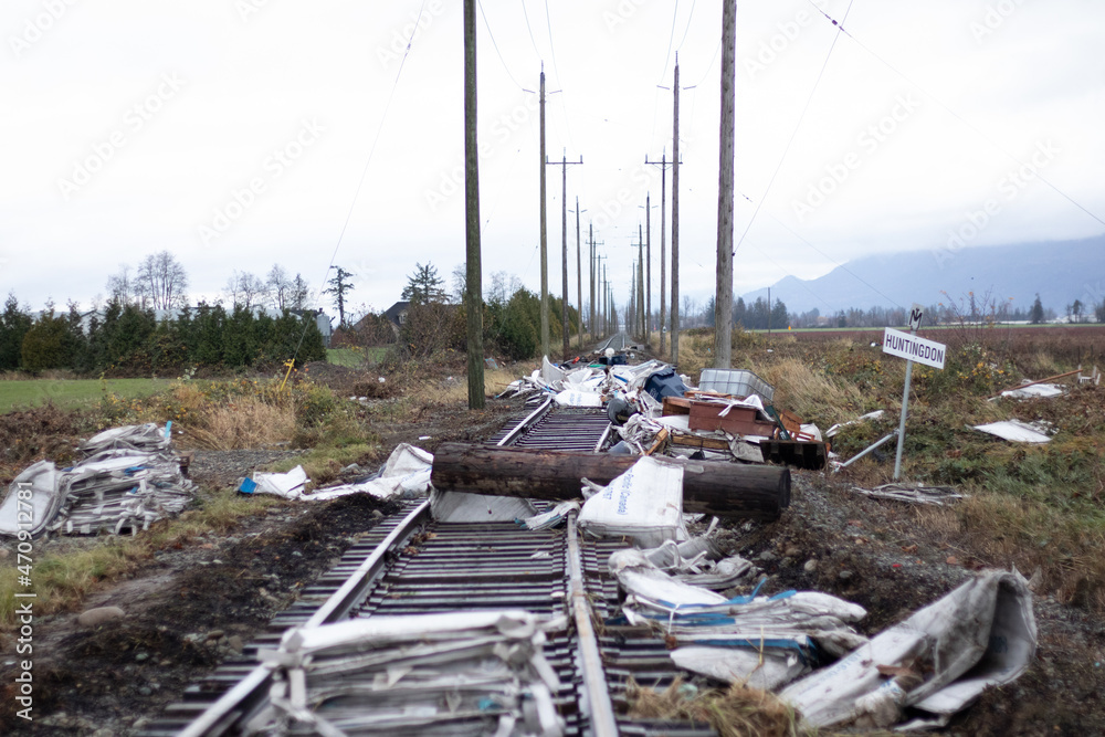 Damage to railroad tracks and garbage after flooding in Abbotsford, British Columbia, Canada