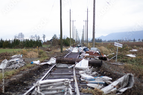 Damage to railroad tracks and garbage after flooding in Abbotsford, British Columbia, Canada photo