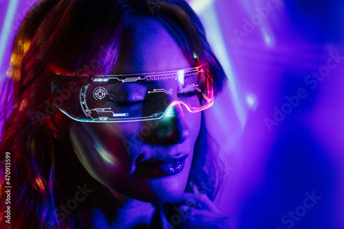 Woman In Neon Lights with Led Glasses photo