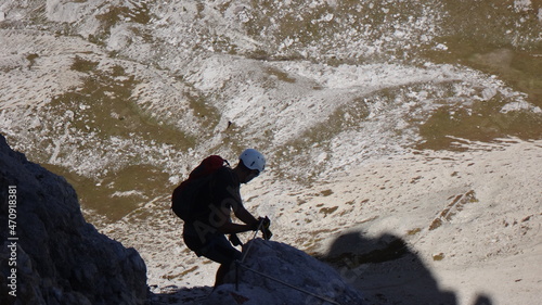Climber in high mountains, via ferraty in italien Dolomites