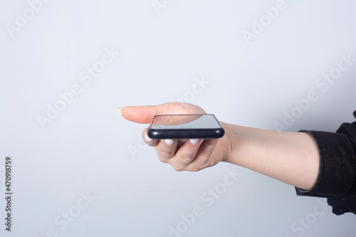 woman hand holding a phone