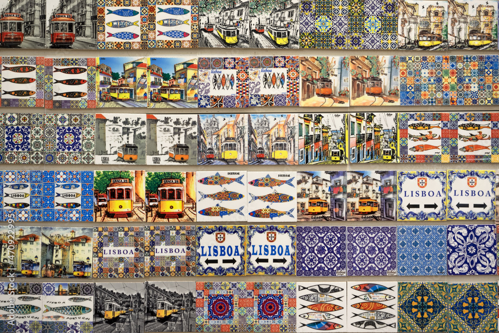 Colorful magnetic souvenirs of Lisbon with the famous yellow tram and Azulejos tiles