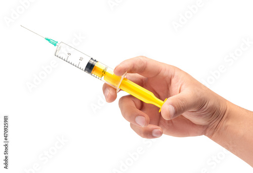 syringe in hand for injection. Medical instrument