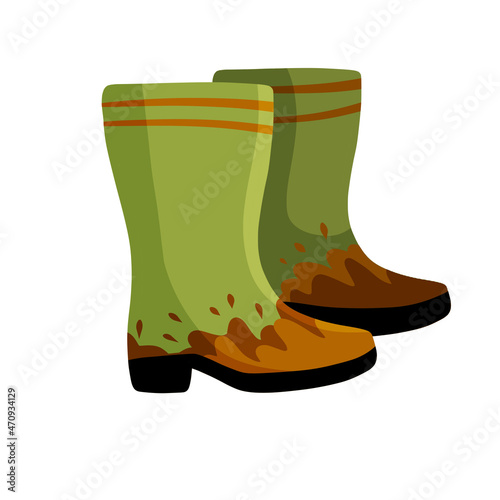 Rubber muddy boot with dirt. Waterproof rain shoes for fishing and gardening.