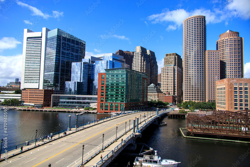 Bridge going over a river in front of a skyline Bridge going over a river in front of a skyline