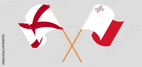 Crossed and waving flags of The State of Alabama and Malta
