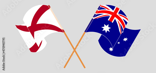 Crossed and waving flags of The State of Alabama and Australia