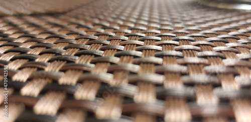 Close-up of the interwoven plastic mat on the table.