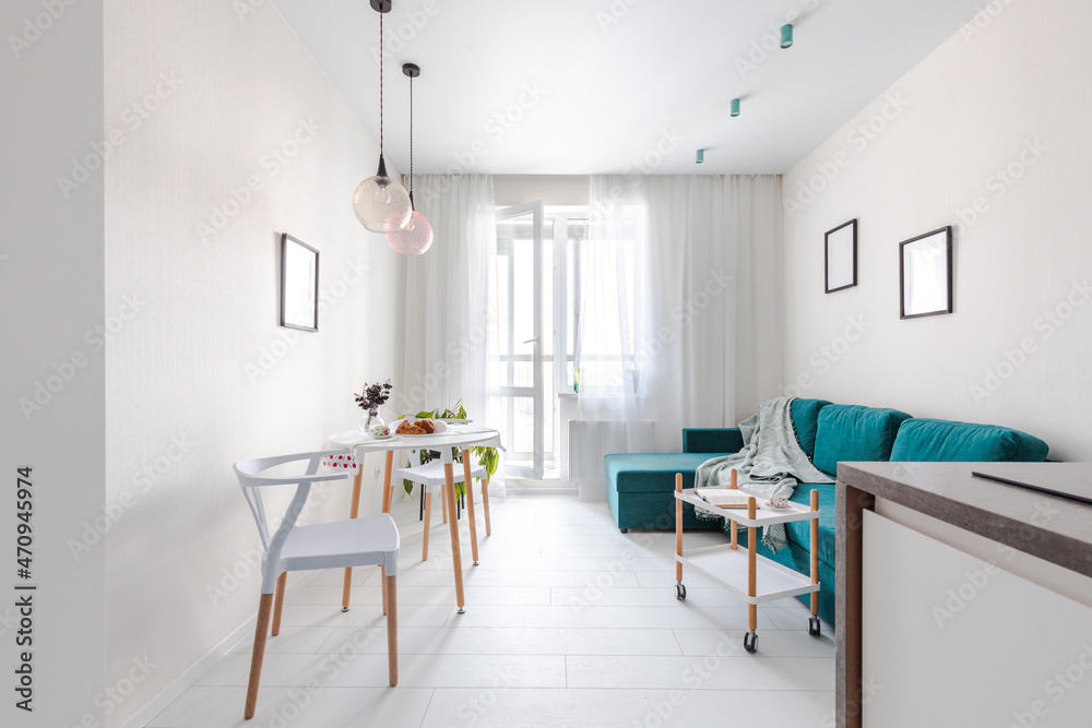 Minimalistic interior design studio apartment with white walls and a ... - Textured Wall And Narrow Sofa Apartment