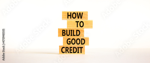 Build good credit symbol. Wooden blocks with words How to build good credit. Beautiful white background, copy space. Business and build good credit concept.
