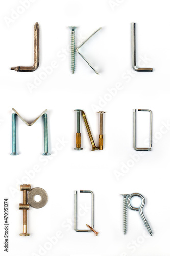 Industrial alphabet. Letters J, K, L, M, N, O, P, Q, R, made of nails and screw.