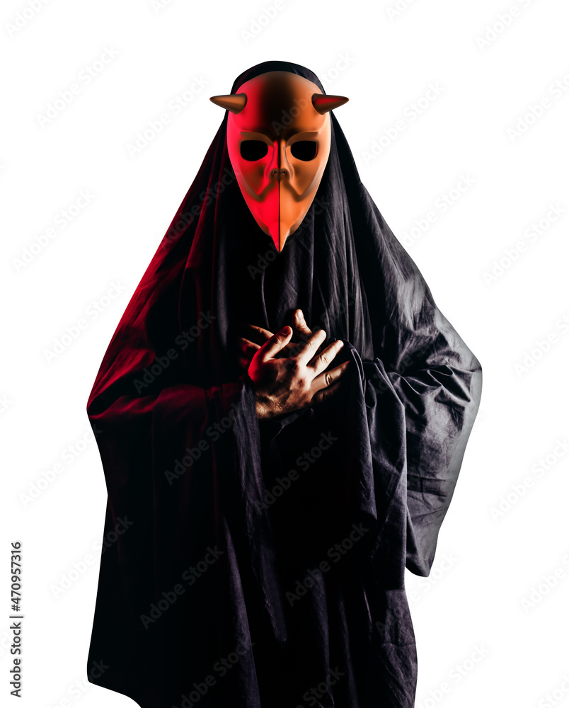 Isolated scary horror occult sectarian priest in black hood and metal mask on white background. Isolated scary horror occult sectarian priest in black hood and metal mask on white background.