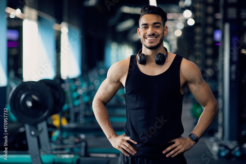 Portrait Of Handsome Young Muscular Middle Eastern Man Posing In Gym