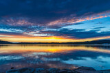 Sunrise waterscape over the bay with cloud cover