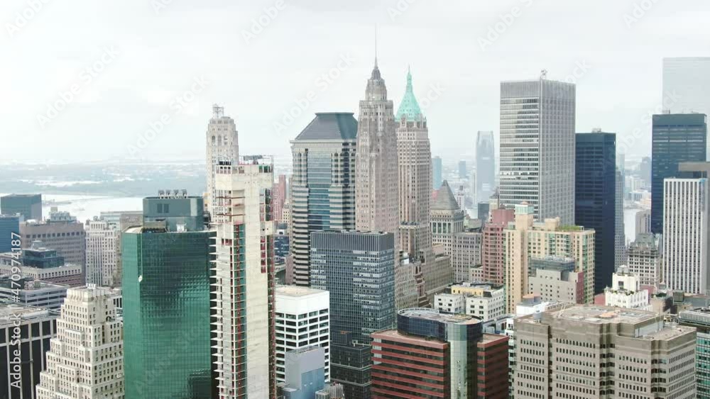 Aerial drone view of busy street in Manhattan skyscrapers, New York City cityscape. NYC holidays tourists visit USA, American urban destination. skyscrapers business center. Aerial drone view of busy street in Manhattan skyscrapers, New York City cityscape. NYC holidays tourists visit USA, American urban destination. skyscrapers business center.