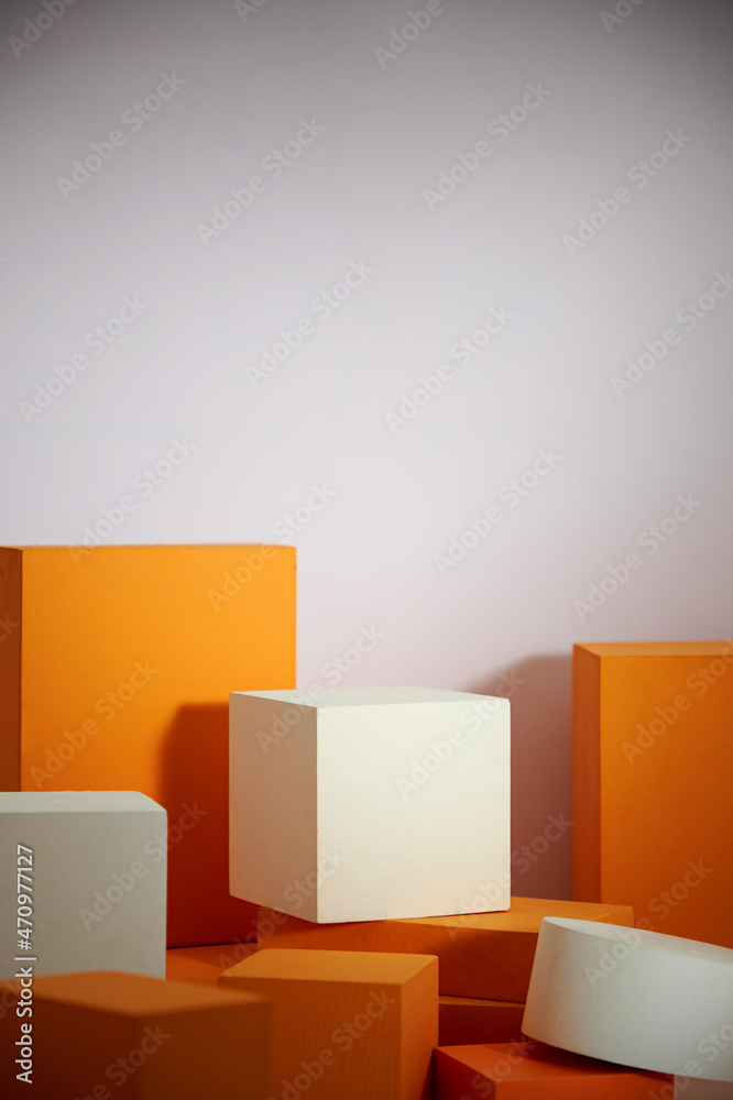 Front view of white and orange podium with in a white background for advertising , abstract content Front view of white and orange podium with in a white background for advertising , abstract content