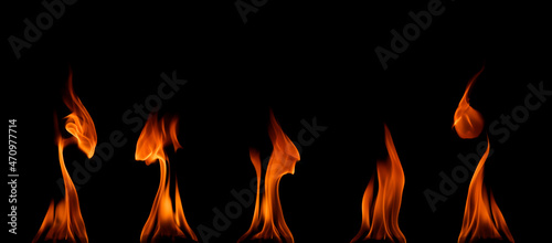 set pile flame red-orange and yellow burning fuel isolated on a black background.