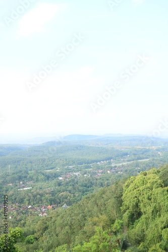 green hill view during the day