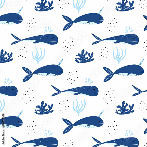 Fototapeta Naklejka Na Ścianę i Meble -  Childrens seamless pattern with blue whales. Patter with cute whale and narwhal. Suitable for fabrics, wrapping papers and prints.