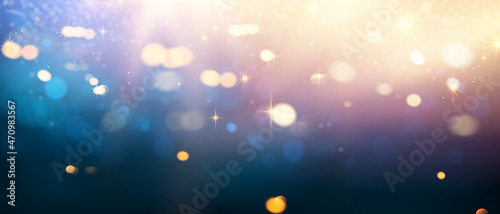 Beautiful gold and blue glitter stars on black blue abstract background are used for celebrations.
