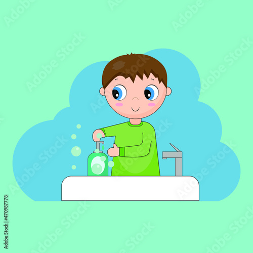 boy washes his hands with soap