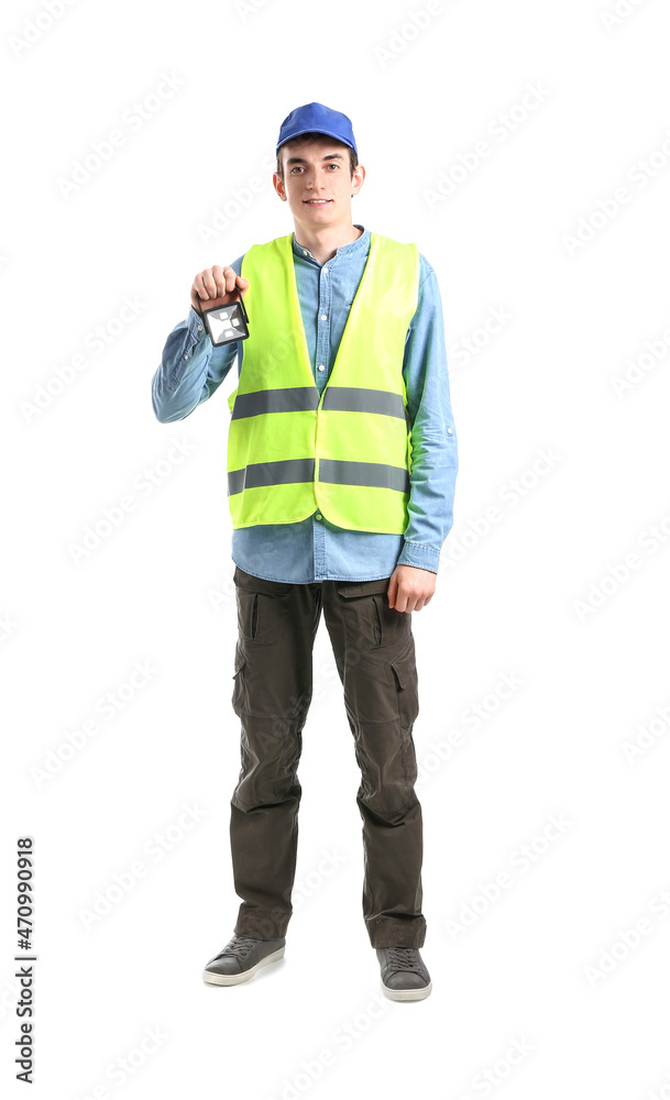 Young male worker with flashlight on white background Young male worker with flashlight on white background