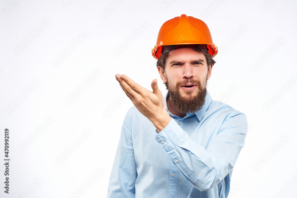man in orange paint shirt construction work studio man in orange paint shirt construction work studio