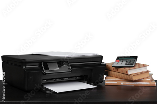 Office table with laser printer and books against white background