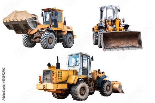 Set of heavy eh wheel loaders on a white isolated background. Construction machinery. Transportation and movement of bulk materials. photo